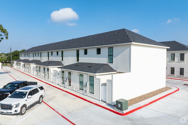 Palm Court Townhome Exterior - Palm Court Townhomes