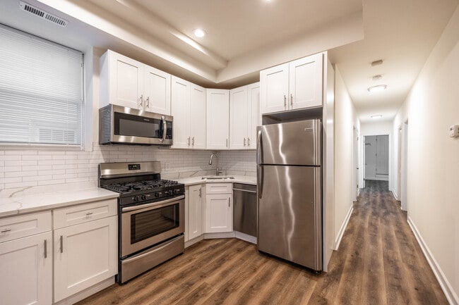 Building Photo - 2112 N Campbell Ave Unit GARDEN