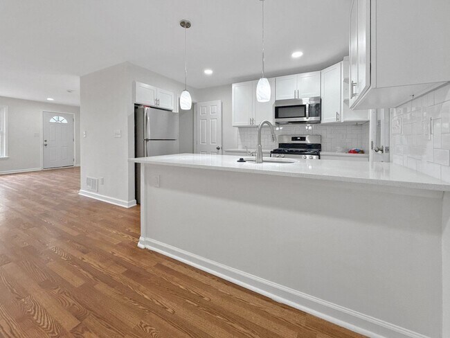 Photo - Spacious 3BR Home with Finished Basement & Flex Space