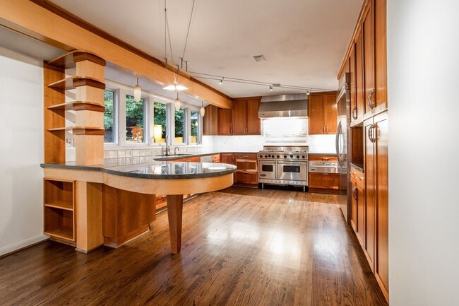 Photo - Portland Heights Home w/High-End Finishes! Double Range Viking Stove, Granite, Wood Floors, Sun R...
