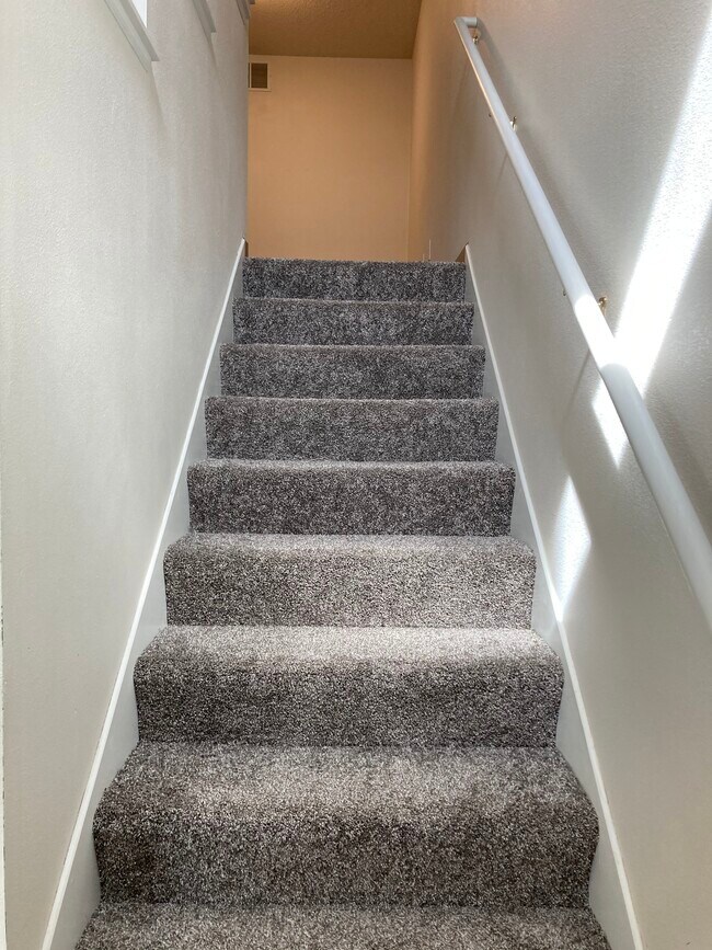 Escaleras a estudio y dormitorios