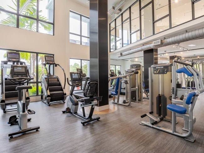 24/7 fitness center with cardio and strength training equipment - AMLI Park West