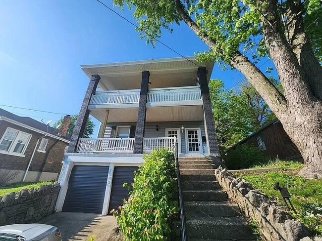 Parking in driveway. - 2242 Buxton Ave Unit 1