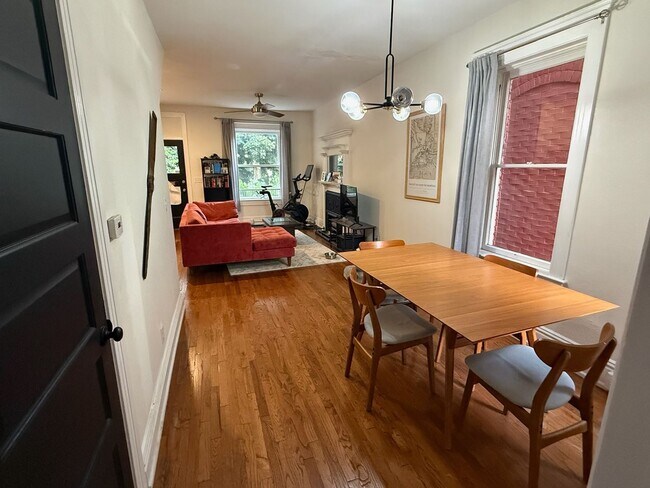 Photo - Remodeled 2 Bed / 2 Bath ½ Townhome | Private Rooftop Patio + Detached Garage |  Available Early ...