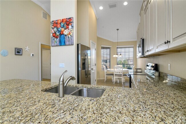 Building Photo - 9440 Benvenuto Ct Unit 3-204 Rental
