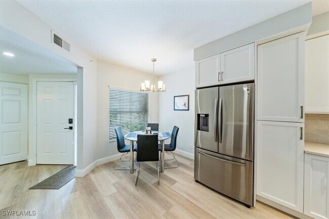 Building Photo - 6914 Satinleaf Rd N Unit 103