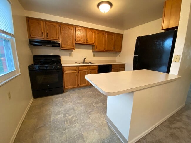 Building Photo - Stunning 2 BR Townhouse with Attached Garage! Central A/C & MORE!! CALL TODAY TO SCHEDULE A TOUR!