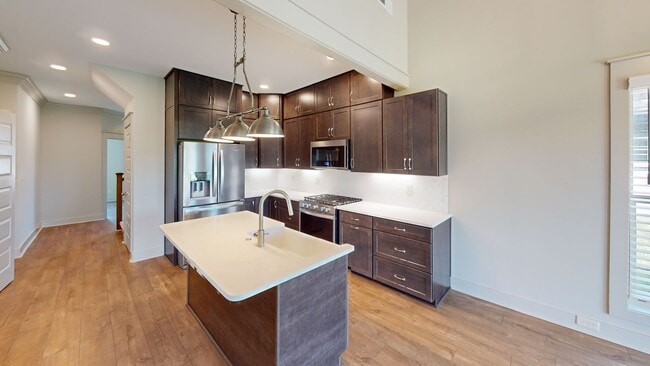 Photo - Stylish Veridian Townhome with Main-Level Primary Suite, Large Kitchen Island and Covered Back Patio