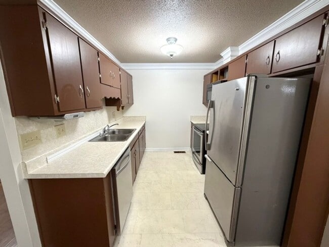 Photo - 2 Bedroom 1 Bath Duplex with garage/basement, side porch, and carport.