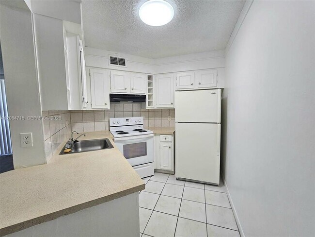 Photo - 210 Lake Pointe Dr Unit 209