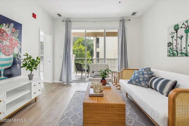 Living Room/Balcony - 8601 Beach Blvd Unidad Southern Grove Condo