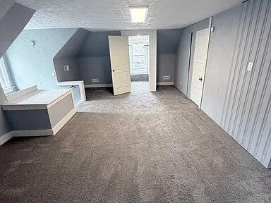 Building Photo - Spacious 6-bedroom, 3-bath home offering a flexible multi-level layout ideal for comfortable living