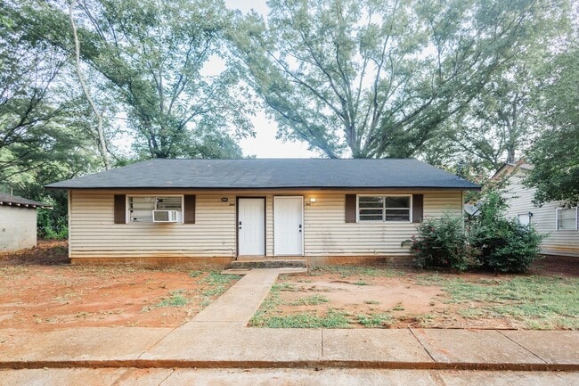 Building Photo - 1013 W Slaton Ave Unit 13