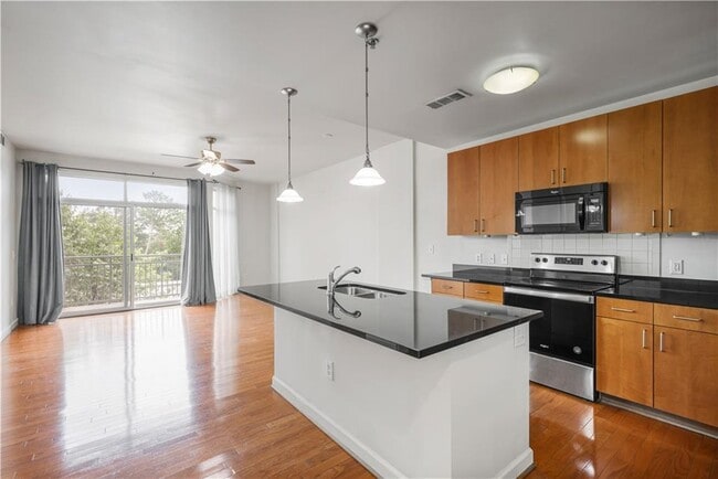 Building Photo - 711 Cosmopolitan Dr NE Unit 425 Rental