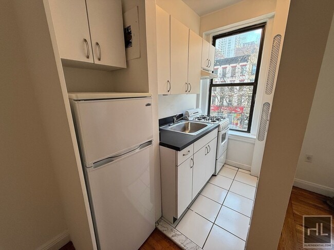 E 58TH ST