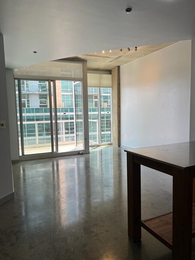 View of Floor to Ceiling windows in living room - 600 12th Ave S Unit 816