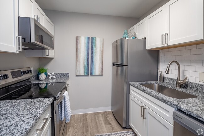 Kitchen with granite counters and stainless appliances
