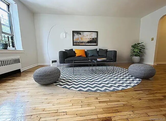 Building Photo - 76-10 34th Ave Unit 1O Rental