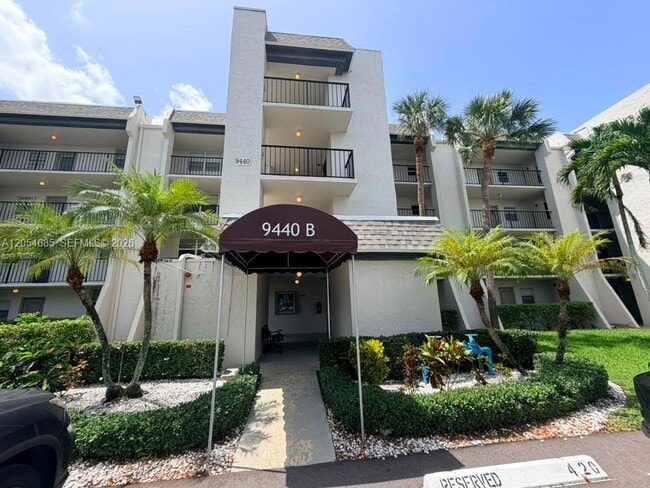 Building Photo - 9440 Poinciana Pl Unit 406