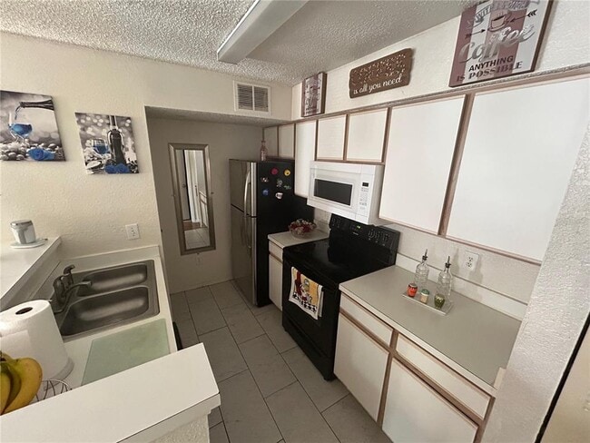 Photo - 2217 Grand Cayman Ct Unit 1221