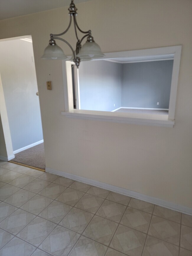 Kitchen into Living Room - 110 W Main St Unit Coach House