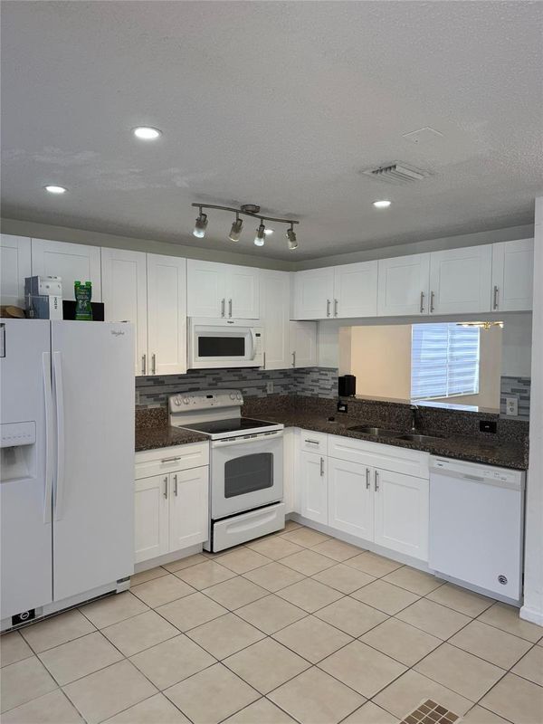 Photo - 4243 NW 68 Way Unidad TOWNHOUSE
