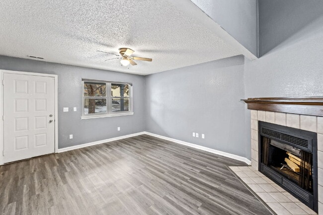 Photo - Charming Two-Story Home with Fenced Yard & Cozy Fireplace — Pet-Friendly!