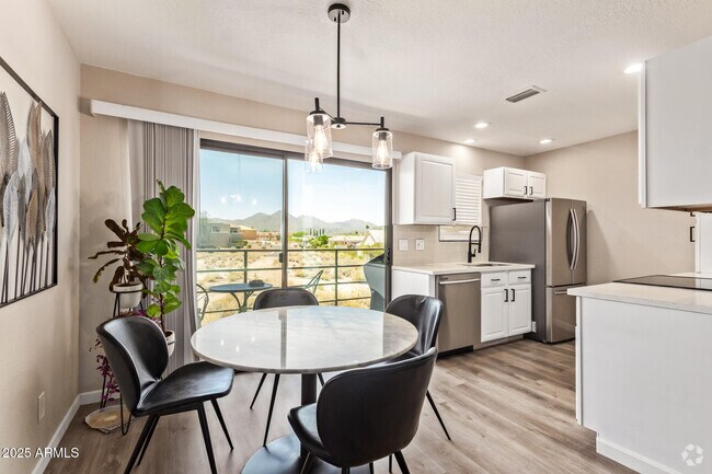 Building Photo - 13606 N Hamilton Dr Unit 203 Rental