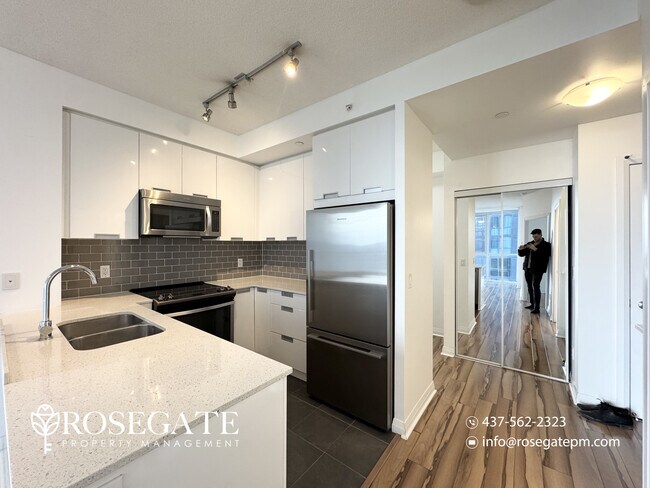 Photo - Modern 1 Bedroom + Den Condo with Balcony & Parking in Prime Mississauga Unit 1310