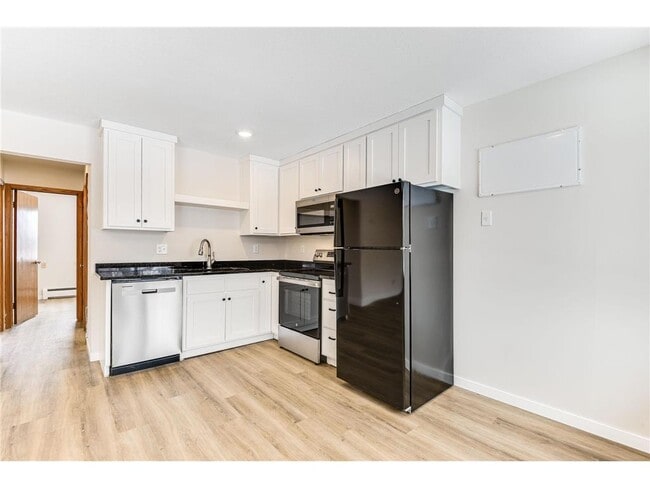 Building Photo - 2740 Xylon Ave N Unit 1