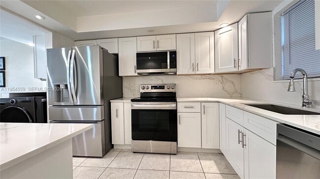 Building Photo - 6200 NW 44th St Unit 208