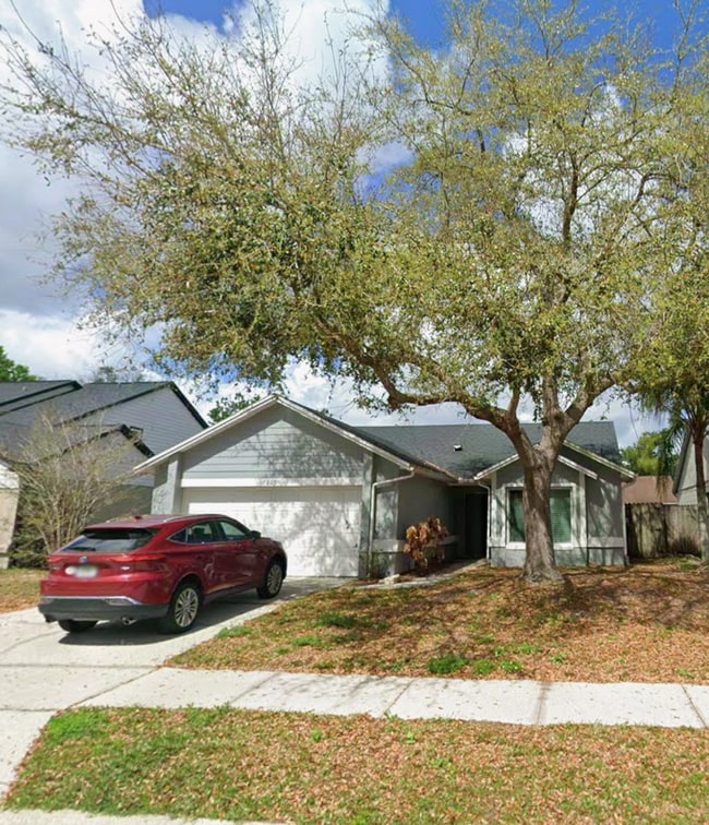 Building Photo - Upgraded Oviedo Home - Screened porch, fenced back yard, wood floors