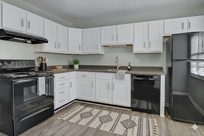 White Shaker-Style Cabinets, Stainless Steel Appliances & Granite Countertops
