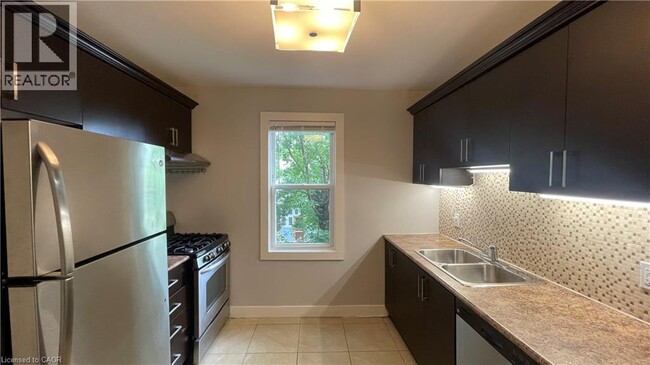 Photo - 1544 King St E Unit 306