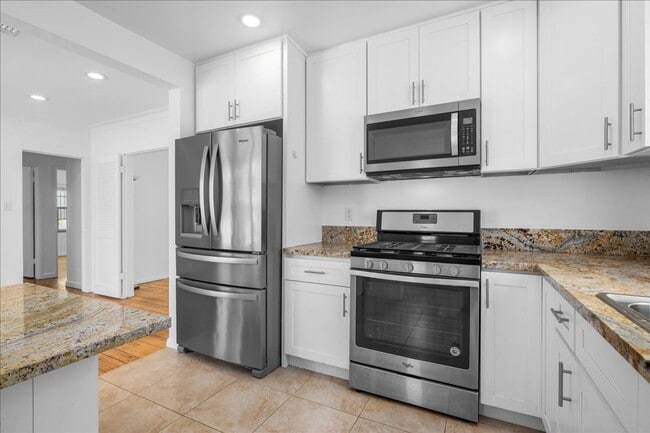 Photo - Corner lot home on a classic tree lined Beverly Hills street