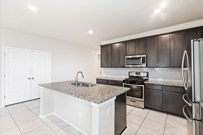 Photo - A rare true dual-suite floorplan in Alamo Ranch — two private en-suite bedrooms, single-story liv...