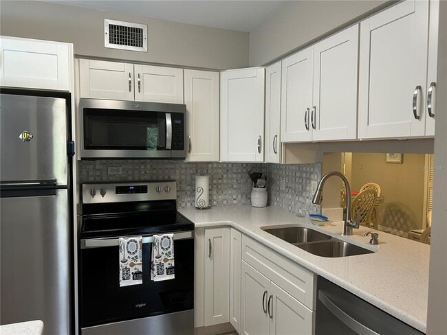 Photo - 5662 Gardens Dr Unit 104