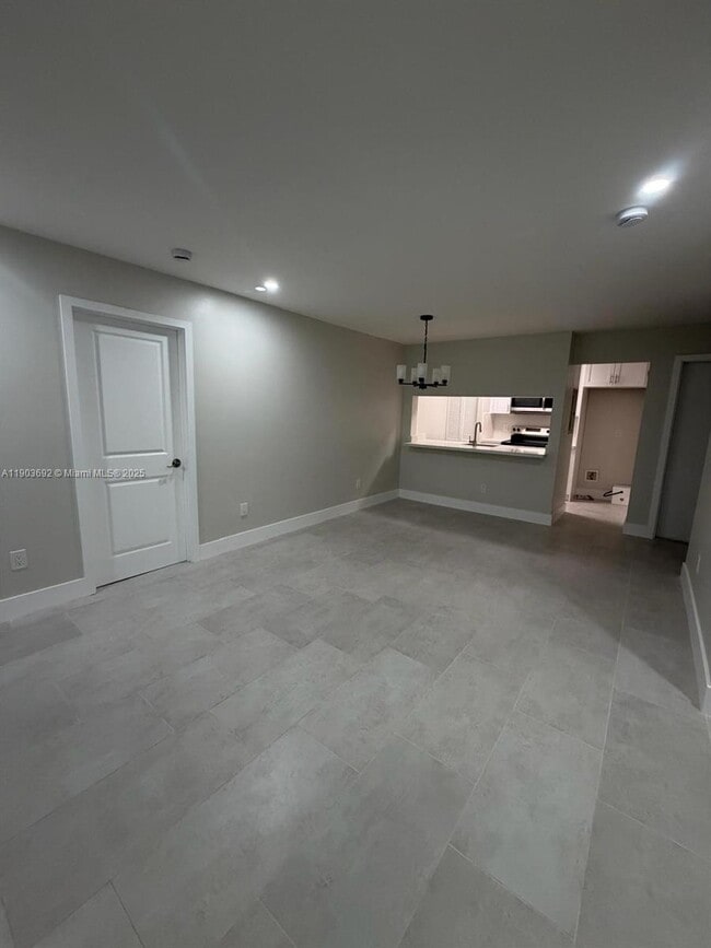 Building Photo - 9716 Hammocks Blvd Unit 201-34