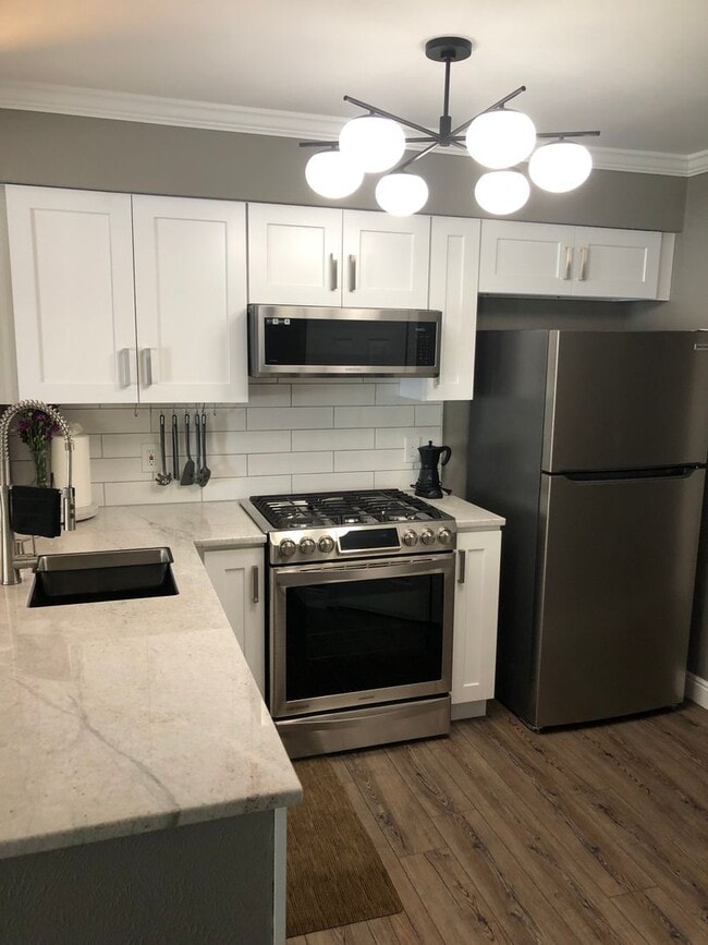 Photo - Luxury 2 Bed 1 Bath Condo w/ ATTACHED GARAGE Unit A