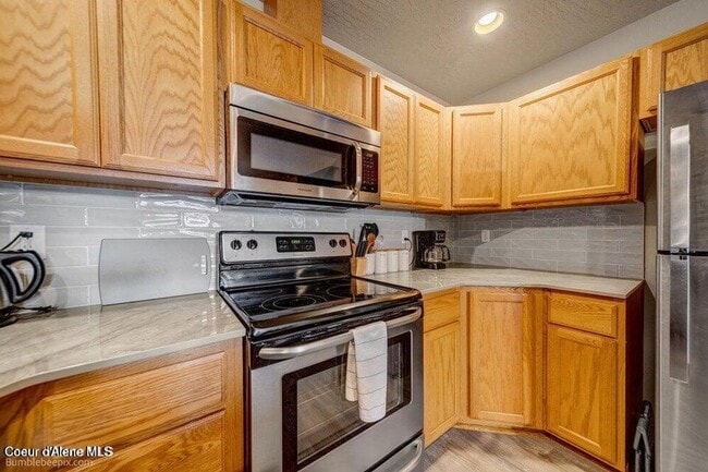 Photo - Beautiful Updated 3 Bedroom Condo with A/C, Garage & Fireplace in Forsythia Place!