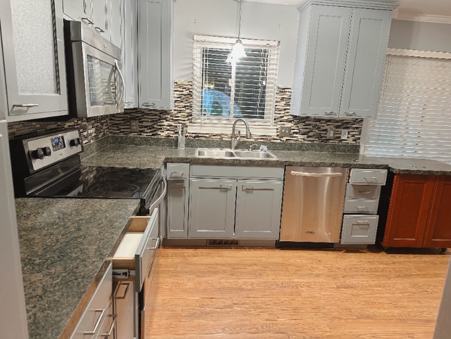 Photo - 59415 Grand River Ave