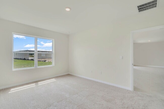 Photo - 4 bedrooms and 2 bathrooms, the spacious 1,828 sq ft home features an open concept with a 2 car g...