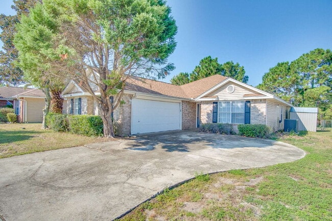 Building Photo - Lakefront Living in Gulf Breeze – Spacious... Rental