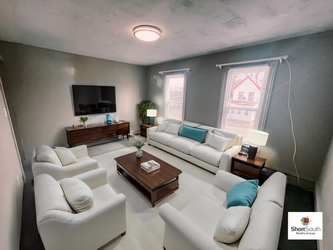 Updated 4 Bed 1 Bath Townhouse - Updated 4 Bed 1 Bath Townhouse