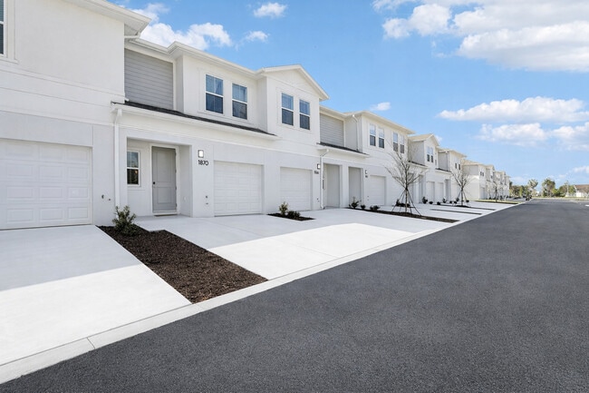 Townhomes with Garage Entry View - Encanto Isla