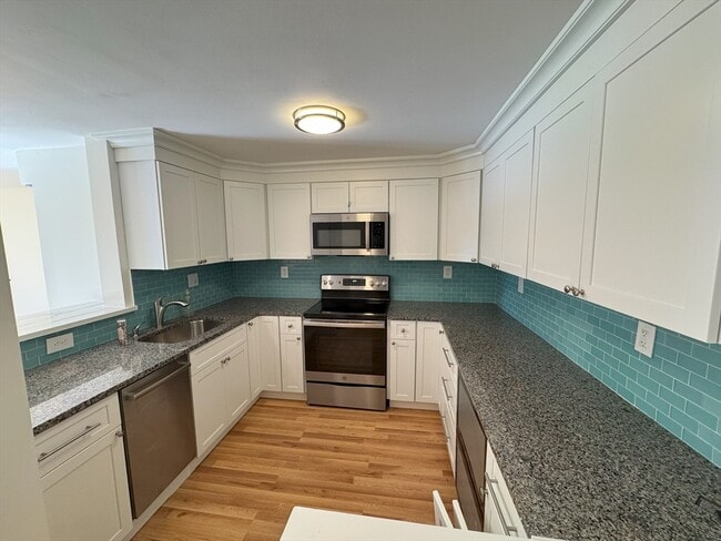 Building Photo - 1321 Worcester Rd Unit 307