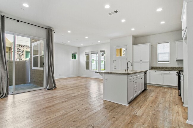 Photo - Stunning 4-Bedroom Home in Gated Tribella Community!