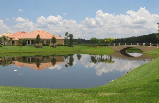 Photo - Gorgeous 3/2 Mediterranean Villa with Waterfront Screened Patio and 2-Car Garage in the Prestigio...