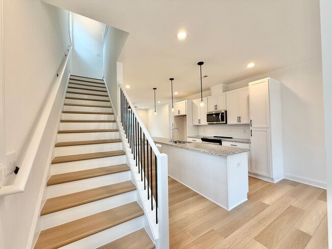 Photo - **OFFERING 1/2 OFF FIRST MONTH'S RENT** Newly Built 4BD, 3.5BA End-Unit Raleigh Townhome in a Gre...