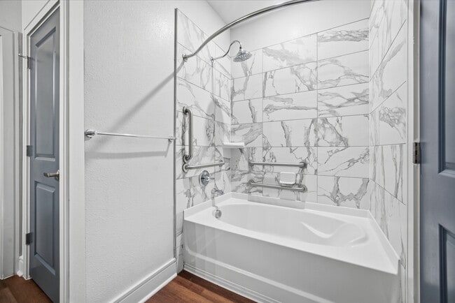 Modern apartment bathroom with a relaxing tub